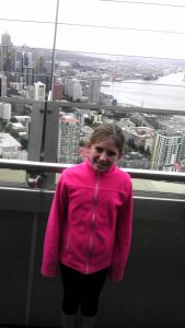 Nine-year-old Claire at the top of the Space Needle.